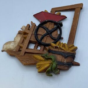 Vintage HOMCO Cast Iron wall decor. Cornmeal grinder decor